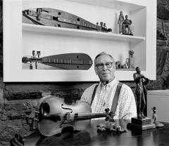 Tim Barnwell  -  Wade Martin, with wood carvings and fiddle, 2002 / Pigment Print  -  11x14 or 16x20