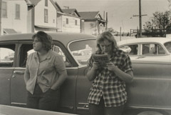 Ruth-Marion Baruch  -  Two Women Leaning Against Car, Walnut Grove, 1961 / Silver Gelatin Print  -  11 x 14