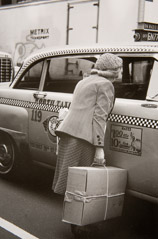 Helen Levitt  -  Woman and Taxi / printed later  -  11 x 7.5
