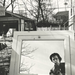   -  Self-Portrait, 1961 (in mirror lr outside) / Silver Gelatin Print  -  12 x 12 (on 16x20 paper)