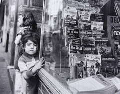 Jules Aarons  -  Paperbacks in the Window, West End, Boston / Silver Gelatin Print  -  9 x 11.5