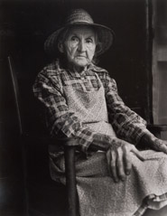 Tim Barnwell  -  Alice Davis Sitting on Porch, Grapevine Section, Madison County, NC, 1983 / Silver Gelatin Print  -  11 x 14