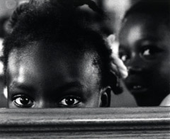 Al Clayton  -  Child in Church, FL / Pigment Print  -  Available in Multiple Sizes