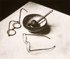 Andre Kertesz  -  Mondrian's Glasses and Pipe, 1926 / Silver Gelatin Print  -  3.25 x 3.75