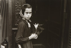 Helen Levitt  -  NY Girl with Lily, 1940 / printed later  -  6.5 x 9