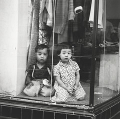 Vivian Maier  -  Untitled, 1955, (children in window) / Silver Gelatin Print  -  12 x 12 (on 16x20 paper)