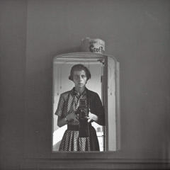 Vivian Maier  -  Self-portrait, New York, NY, early 1950s (11/2020) / Silver Gelatin Print  -  12 x 12 (on 16x20 paper)