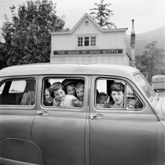 Vivian Maier  -  Canada, n.d. (kids in car) / Silver Gelatin Print  -  12 x 12 (on 16x20 paper)