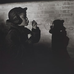 Vivian Maier  -  Chicago area, 1961 (bubbles) / Silver Gelatin Print  -  12 x 12 (on 16x20 paper)