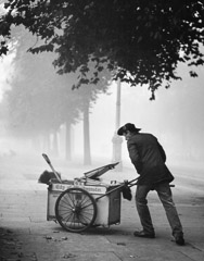 Wolf Suschitzky  -  Street Cleaner, Westminster, London, 1934 / Silver Gelatin Print  -  12 x 16