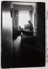 Herb Snitzer  -  Trombone player Trummy Young, of the Louis Armstrong band, in a NYC hotel room, 1960 / Silver Gelatin Print  -  framed