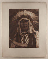 Edward S. Curtis  -  Yellow Owl - Mandan, Plate 148, 1908 / Photogravure, John Andrew & Son  -  15.5 x 11.75 (image) on 22.25 x 18.25 paper