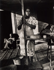 Arnold Newman  -  Woman on Porch, West Palm Beach, FL, 1940 / Silver Gelatin Print  -  11 x 14