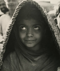 Dorothea Lange  -  Child with Choir Hood, Pakistan 1958 / Silver Gelatin Print  -  9.875 x 8.25