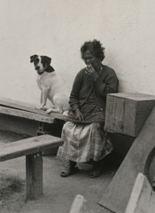 Ruth-Marion Baruch  -  Filipino Woman with Dog, 1961 / Silver Gelatin Print  -  9.5 x 6.5