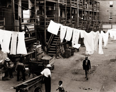 Peter Sekaer  -  Untitled (tenement street with laundry), c.1936 / Silver Gelatin Print  -  7 1/2 X 9 5/8 