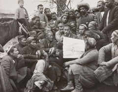 Georgi Zelma  -  Mohammed Dadabaev reading the Decree on Land and Water Reforms, 1920's
 / Silver Gelatin Print  -  8.5 x 10.75  
