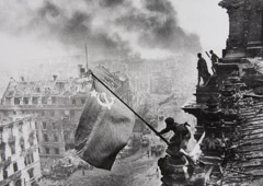 Yevgeny Khaldei  -  Raising the Hammer and Sickle over the Reichstag, 1945 / Silver Gelatin Print  -  8 x 11