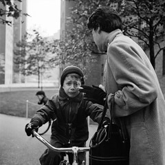 Vivian Maier  -  1954 New York, NY (boy on bike) / Silver Gelatin Print  -  12 x 12 (on 16x20 paper)