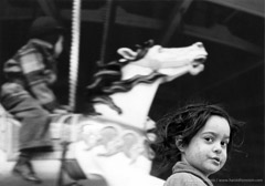 Harold Feinstein  -  Gypsy Girl and Carousel, 1946 / Silver Gelatin Print  -  available in multiple sizes