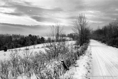 Harold Feinstein  -  Snowy Country Road, Vermont, 1974 / Silver Gelatin Print  -  16 x 20