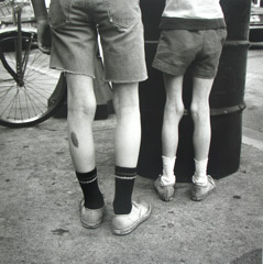 Vivian Maier  -  Chicago, IL, no date, (legs) / Silver Gelatin Print  -  12 x 12 (on 16x20 paper)