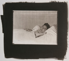 Berenice Abbott  -  Cocteau in Bed with Mask, Paris, 1927 / Platinum Palladium Print  -  4 x 5 image on 8.5 x 11 paper
