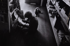 Dorothea Lange  -  Boy Reading Comics and Dog, 1956 / Silver Gelatin Print  -  