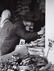 Ruth-Marion Baruch  -  Man Shopping at Chinese Grocery, San Francisco, 1961 / Silver Gelatin Print  -  