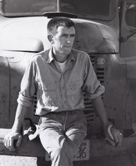 Pirkle Jones  -  Man Sitting on Truck Bumper, Walnut Grove, 1961 /   -  