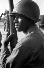 Harold Feinstein  -  Soldier Helmet and Rifle Ready /   -  Neg_A-57