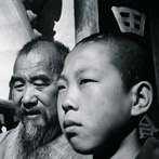 John Gutmann, Chief Monk and Novice of a Buddhist Temple. YunnanProvince, Chi