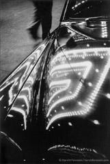 Harold Feinstein  -  CL-024 Times Square Lights Reflected on Car, 1953 /   -  Neg-042 NYC TimesSquare